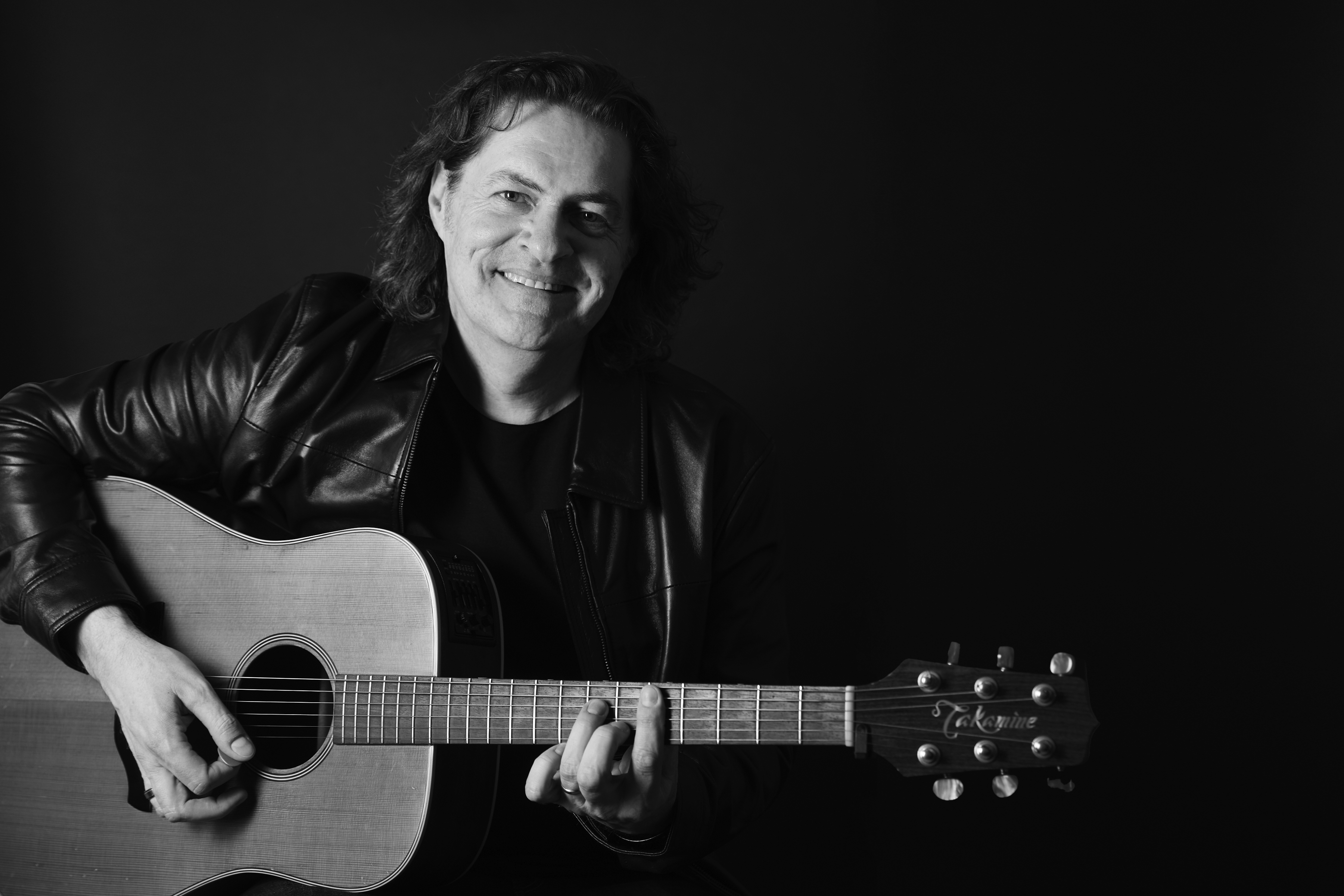 Mark Hughes, acoustic guitar and singer solo in Melbourne